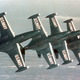 F9F-5 Panthers flown by the US Navy Blue Angels demonstration squadron. The Panther was the first jet flown by the Blue Angels, serving from 1951-1954. (US Navy)